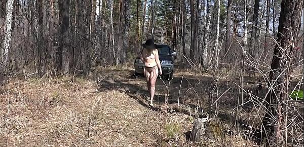  A naked blonde with a juicy PAWG, hairy pussy, and beautiful legs in pantyhose walk outdoor. Exhibitionism and foot fetish on nature.